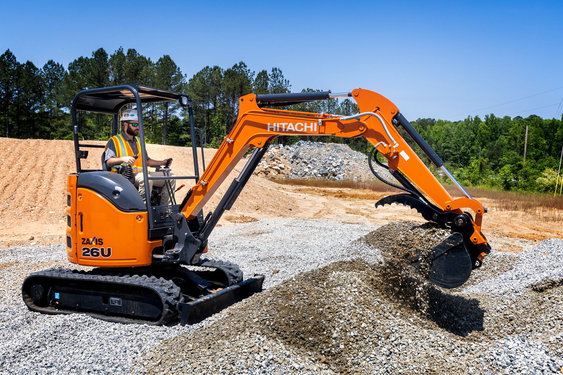 Hitachi ZX26U-5N Compact Excavator digging gravel