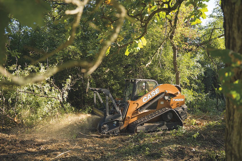 Case TV620B compact track loader in woods mulching brush