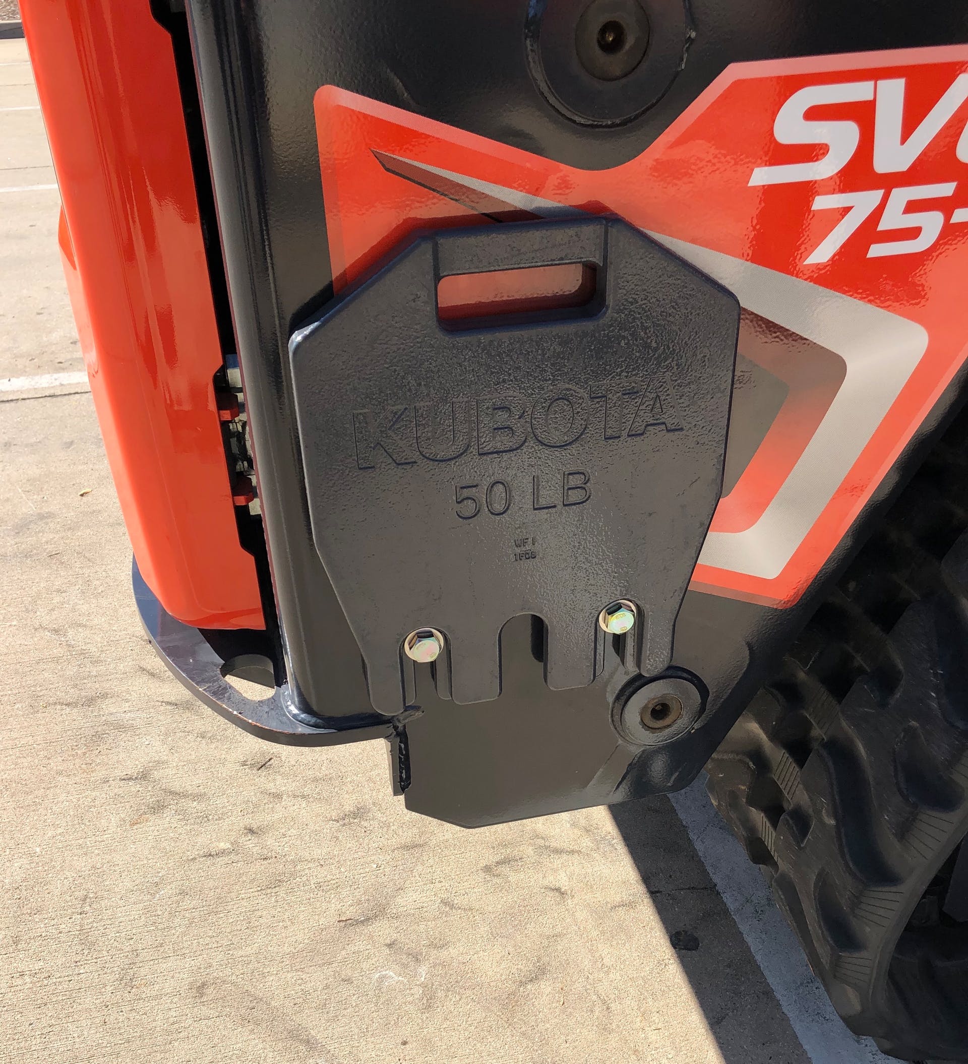 Kubota SVL75-3 compact track loader side view ballast location