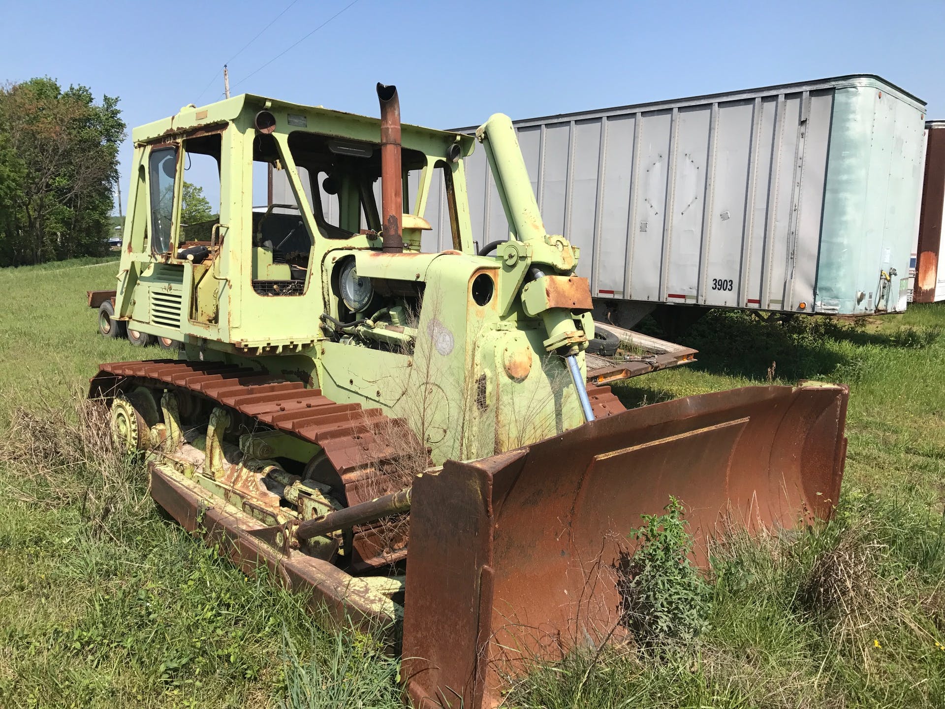 Terex D700A dozer before restoration rusted in weeds